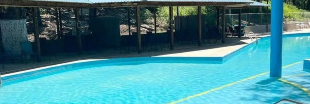 Aerial view of 250000 gallon spring-fed swimming pool at Inez Spring RV park in Eastland Texas