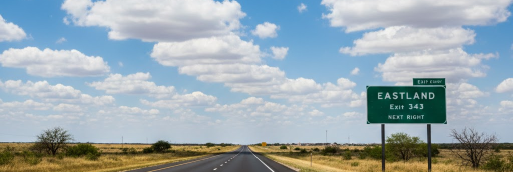 The I-20 highway in Texas, leading to Exit 343 for Eastland, a corridor known for affordable monthly RV parks.